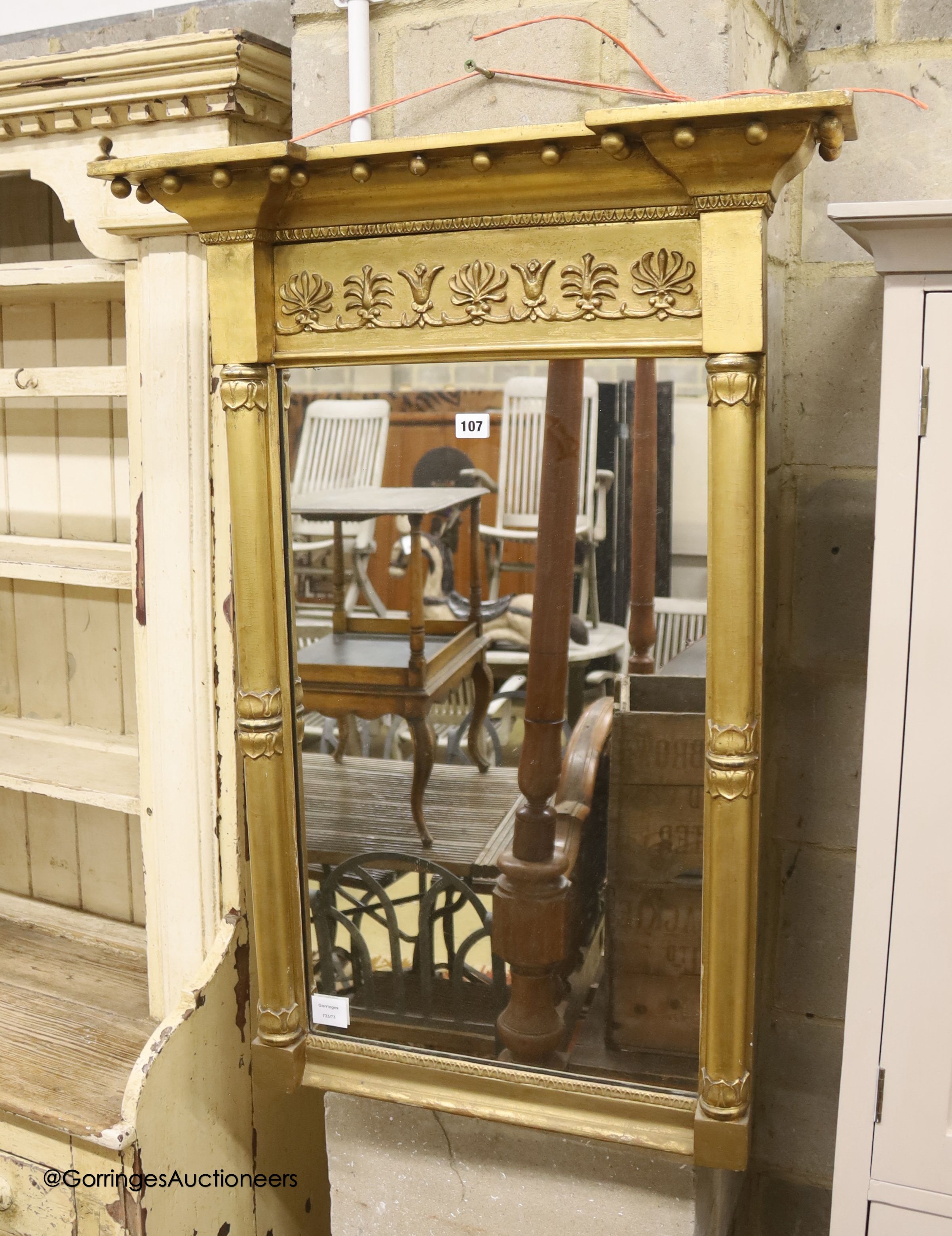 A Regency giltwood and gesso pier glass, width 67cm height 95cm